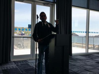 President Gaurav Sharma at the podium